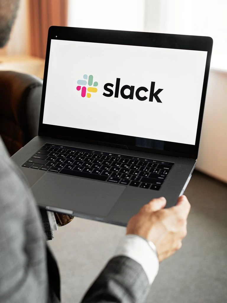 A before-state view of a fragmented Slack plus Discourse setup.